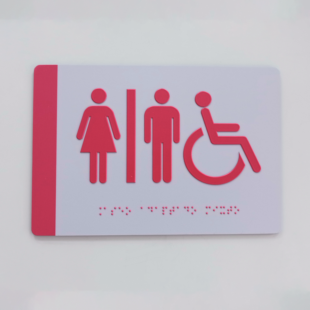 Señal de baño mixto accesible para el Juzgado de Nules